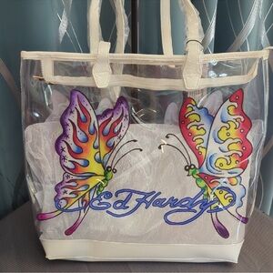 Ed Hardy Butterfly Artwork Clear
PVC Tote Bag, White Faux Leather Trim, NWT 🦋